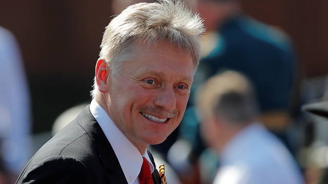 Kremlin spokesman Dmitry Peskov smiles before the Victory Day Parade in Red Square in Moscow, Russia June 24, 2020. The military parade, marking the 75th anniversary of the victory over Nazi Germany in World War Two, was scheduled for May 9 but postponed due to the outbreak of the coronavirus disease (COVID-19). REUTERS/Maxim Shemetov

