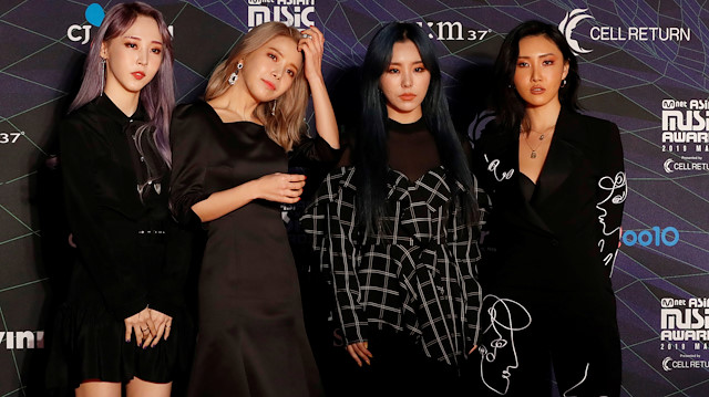 Members of South Korean girl group MAMAMOO pose on the red carpet during the annual MAMA Awards at Nagoya Dome in Nagoya, Japan, December 4, 2019. REUTERS/Kim Kyung-Hoon

