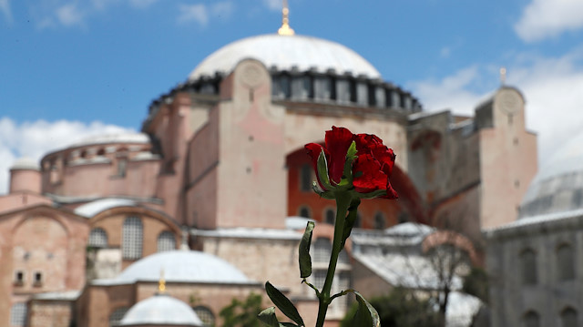A red rose is attached to the security barriers in front the Hagia Sophia 