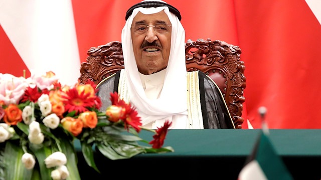 FILE PHOTO: Kuwait's Emir Sheikh Sabah Al-Ahmad Al- Jaber Al-Sabah witnesses a signing ceremony at the Great Hall of the People in Beijing, China, July 9, 2018. Andy Wong/Pool via REUTERS/File Photo

