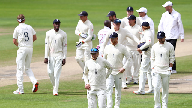 Cricket - Third Test - England v West Indies - Emirates Old Trafford, Manchester, Britain - July 28, 2020 England's Joe Root celebrates winning the test series with teammates, as play resumes behind closed doors following the outbreak of the coronavirus disease (COVID-19) Michael Steele/Pool via REUTERS
