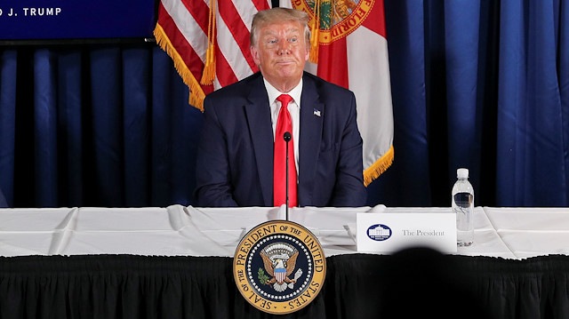 U.S. President Donald Trump participates in a "COVID-19 Response and Storm Preparedness" event with Florida Governor Ron DeSantis and U.S. Health and Human Services (HHS) Secretary Alex Azar at the Pelican Golf Club in Belleair, Florida, U.S., July 31, 2020. REUTERS/Tom Brenner

