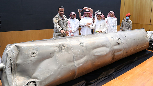 Saudi-led coalition spokesman, Colonel Turki al-Malki, displays the debris of a ballistic missile which he says was launched by Yemen's Houthi group towards the capital Riyadh, during a news conference in Riyadh, Saudi Arabia March 29, 2020. REUTERS/Ahmed Yosri  