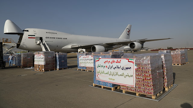 Packages of humanitarian aid with Iran's Red Cresent Logo on them are seen at a loading operation of Iran's humanitarian aid to Lebanon after the massive blast in Beirut, at Mehrabad Airport west of Tehran, Iran August 5, 2020.