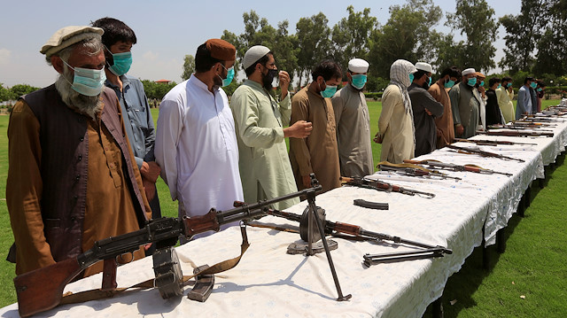 Members of the Taliban handover their weapons 