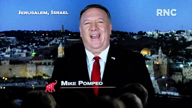 U.S. Secretary of State Mike Pompeo is seen giving his pre-recorded address to the 2020 Republican National Convention from Israel on a monitor set up in the Rose Garden of the White House in Washington, U.S., August 25, 2020. REUTERS/Kevin Lamarque 