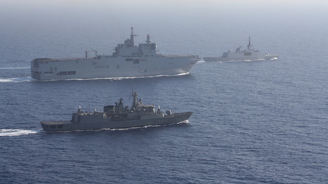 Greek and French vessels sail in formation during a joint military exercise in Mediterranean sea, in this undated handout image obtained by Reuters on August 13, 2020. Greek Ministry of Defence/Handout via REUTERS