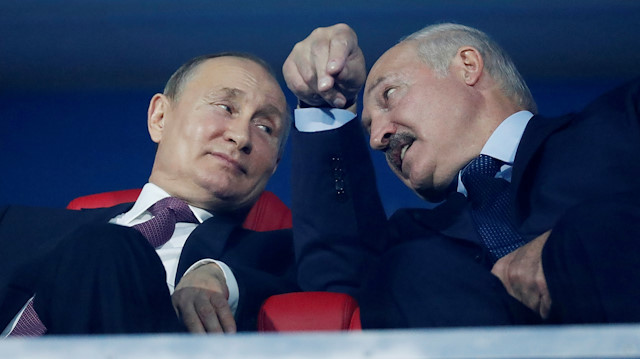 Russian President Vladimir Putin 
 and Belarus President Alexander Lukashenko