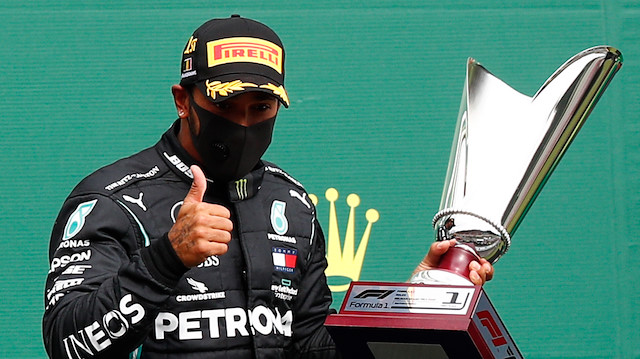 Formula One F1 - Belgian Grand Prix - Spa-Francorchamps, Spa, Belgium - August 30, 2020 Mercedes' Lewis Hamilton celebrates with the trophy on the podium after winning the race Pool via REUTERS/Francois Lenoir

