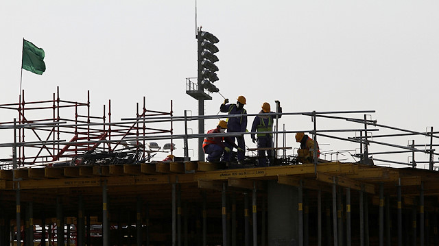 Migrant labourers work at a construction site at the Aspire Zone in Doha, Qatar, March 26, 2016. REUTERS/Naseem Zeitoon/File Photo

