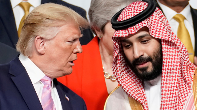 FILE PHOTO: U.S. President Donald Trump speaks with Saudi Arabia's Crown Prince 