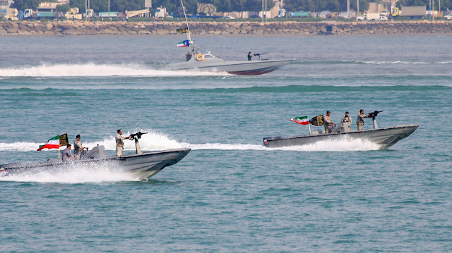 A naval company drills during the annual military parade in Bandar Abbas