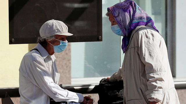 Elderly people wearing protective face masks amid the outbreak of the coronavirus disease (COVID-19) are seen in central Kyiv, Ukraine September 11, 2020. REUTERS/Gleb Garanich