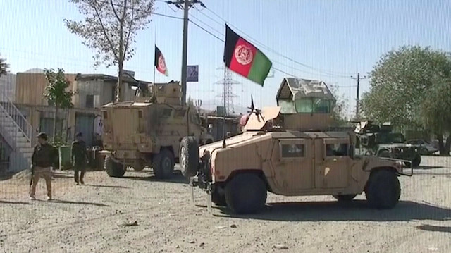 File photo: Security Humvees gather near a site attacked by Taliban in Sayeed Abad district, Wardak Province, Afghanistan, in this still image taken from video on October 7, 2018