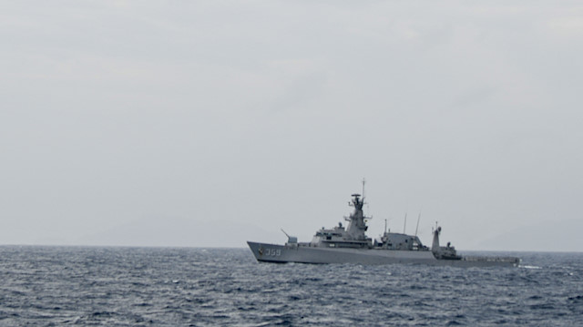 Indonesian Airforce's F-16 Jet Fighter flies over Indonesian navy warship during an operation in Natuna, near the South China Sea, Indonesia, January 10, 2020.