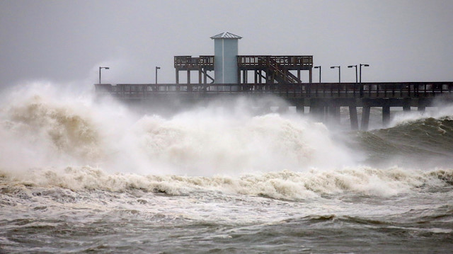 Waves crash along a pier as Hurricane Sally approaches in Gulf Shores, Alabama, U.S., September 15, 2020. 