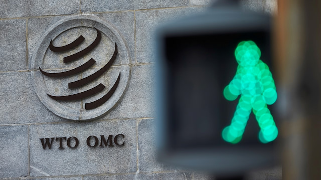 FILE PHOTO: A logo is pictured in front of the World Trade Organization (WTO) in Geneva, Switzerland, July 22, 2020