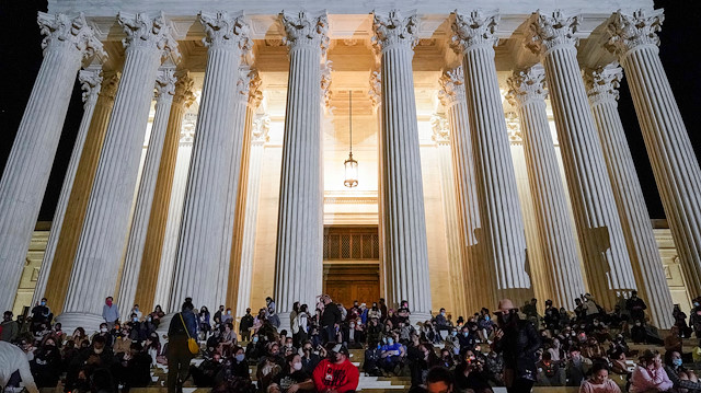 People mourn the death of Associate Supreme Court Justice Ruth Bader Ginsburg at the Supreme Court in Washington, U.S., September 18, 2020.