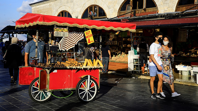 A street vendor waits for customers near the Spice Market also known as the Egyptian Bazaar as the outbreak of the coronavirus (COVID-19) continues, in Istanbul, Turkey September 9, 2020. REUTERS/Umit Bektas

