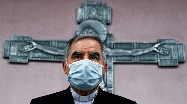 Cardinal Giovanni Angelo Becciu, who has been caught up in a real estate scandal, meets with the media a day after he resigned suddenly and gave up his right to take part in an eventual conclave to elect a pope, near the Vatican, in Rome, Italy, September 25, 2020. REUTERS/Guglielmo Mangiapane

