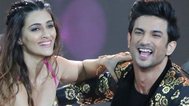 Actors Kriti Sanon (L) and Sushant Singh Rajput perform at the International Indian Film Academy Awards (IIFA) show at MetLife Stadium in East Rutherford, New Jersey, U.S., July 15, 2017. Picture taken July 15, 2017. REUTERS/Joe Penney

