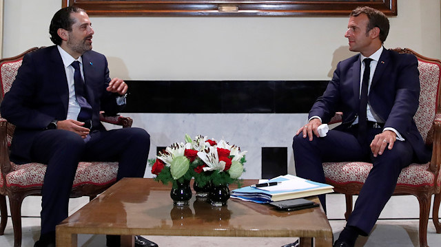 French President Emmanuel Macron meets with former Lebanese Prime Minister Saad Hariri
