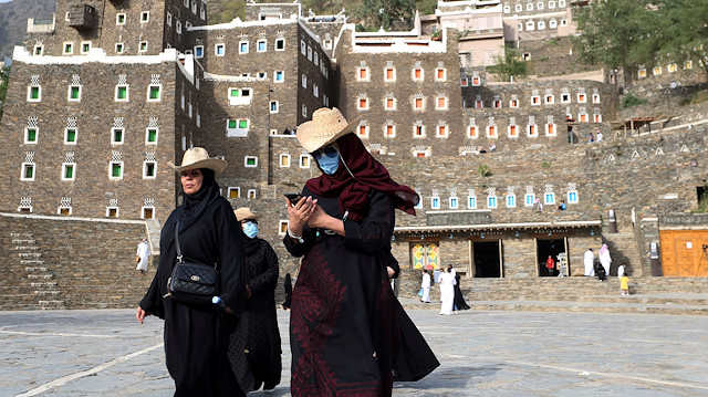 File photo: Tourists visit the cultural village of Rijal Almaa in the outskirts of Abha, Saudi Arabia July 17, 2020
