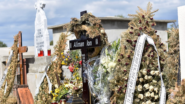 Funeral wreaths near the grave of late mayor Ion Aliman, in Deveselu, southern Romania, September 28, 2020.