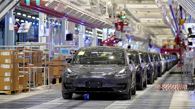 FILE PHOTO: Tesla China-made Model 3 vehicles are seen during a delivery event at its factory in Shanghai, China January 7, 2020. REUTERS/Aly Song

