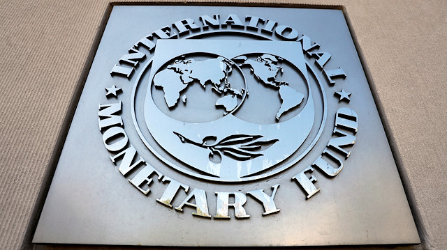 International Monetary Fund logo is seen outside the headquarters building during the IMF/World Bank spring meeting in Washington, U.S., April 20, 2018.