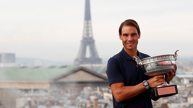 Tennis - French Open - Galeries Lafayette Rooftop, Paris, France - October 12, 2020 Spain's Rafael Nadal poses with the trophy after winning the French Open yesterday REUTERS/Gonzalo Fuentes

