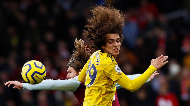 File photo: Soccer Football - Premier League - Burnley v Arsenal - Turf Moor, Burnley, Britain - February 2, 2020 Arsenal's Matteo Guendouzi in action with Burnley's Jeff Hendrick Action Images via Reuters/Jason Cairnduff 