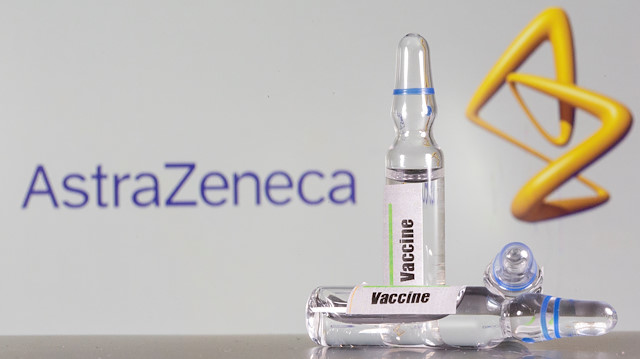 FILE PHOTO: A test tube labeled with the vaccine is seen in front of AstraZeneca logo in this illustration taken, September 9, 2020. REUTERS/Dado Ruvic/File Photo

