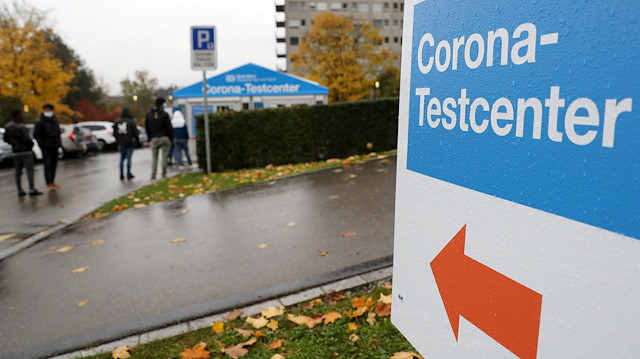 A sign marks the way to a COVID-19 testing site of the Stadtspital Triemli hospital as the spread of the coronavirus disease (COVID-19) continues in Zurich, Switzerland October 23, 2020