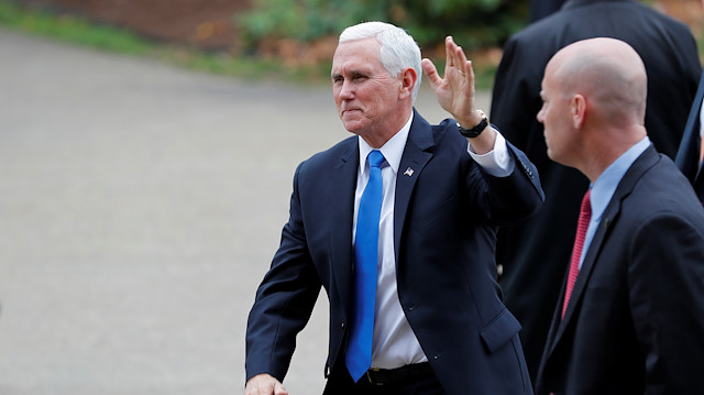 File photo: U.S. Vice President Mike Pence waves to supporters outside the New Hampshire State House as his Chief of Staff Marc Short looks on after Pence filed candidacy papers for President Donald Trump to appear on the 2020 New Hampshire primary election ballot in Concord, New Hampshire, U.S., November 7, 2019