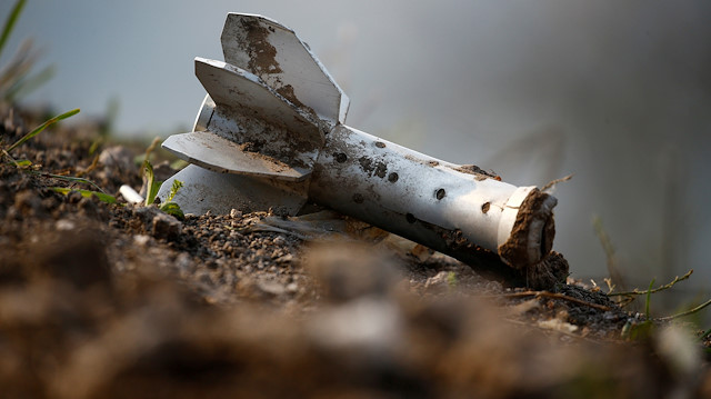 FILE PHOTO: A view shows a fragment of an artillery shell at the fighting positions of ethnic Armenian soldiers on the front line during a military conflict against Azerbaijan's armed forces in the breakaway region of Nagorno-Karabakh, October 20, 2020. REUTERS/Stringer/File Photo  