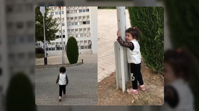 2,5 yaşındaki Ada Mila, direkteki Türk bayrağına sarılmak istedi.