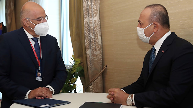 Turkish Foreign Minister Mevlut Cavusoglu meets with his Greek counterpart Nikos Dendias 