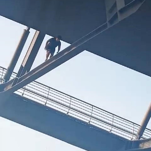 Beğeni uğruna tehlikeye aldırmadan Haliç Köprüsü kirişlerinde yürüdü