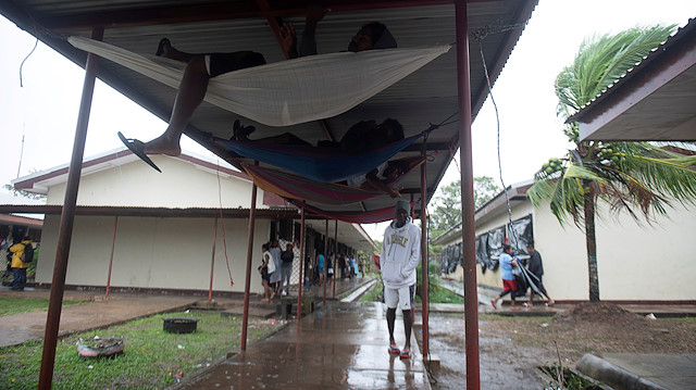 People rest in hammocks at a school being used as a shelter as Hurricane Iota approaches Puerto Cabezas, Nicaragua November 16, 2020