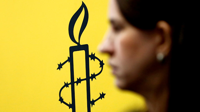 The logo of Amnesty International is seen 