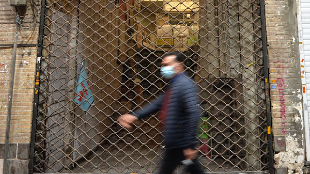 Iran tightens COVID-19 restrictions, but some streets still busy