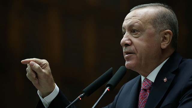 Turkish President Tayyip Erdogan addresses members of his ruling AK Party