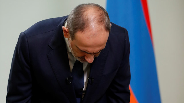 Armenian Prime Minister Nikol Pashinyan bows during his address to the nation in Yereva