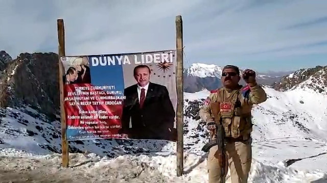 Güvenlik korucusu PKK'dan temizlenen bölgeye Cumhurbaşkanı Erdoğan’ın posterini astı