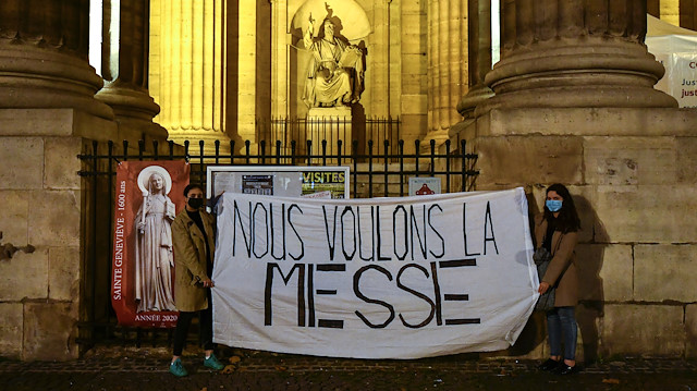Catholics gather to protest against the closure of Sunday Mass in France
