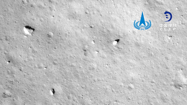 An image taken by China's Chang'e-5 spacecraft during its landing on the moon is seen
