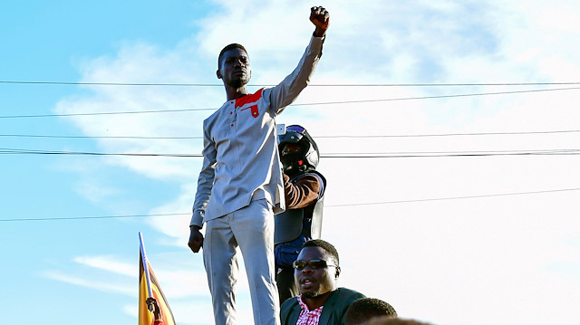 Ugandan pop star and presidential candidate Robert Kyagulanyi, also known as Bobi Wine, campaigns near Kampala, Uganda, November 30, 2020.