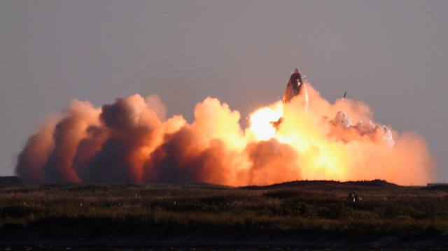 SpaceX's first super heavy-lift Starship SN8 rocket explodes during a return-landing attempt after it launched from their facility on a test flight in Boca Chica, Texas U.S. December 9, 2020