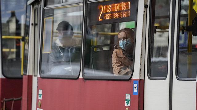 Passengers wear masks on a tram amid coronavirus disease (COVID-19) restrictions